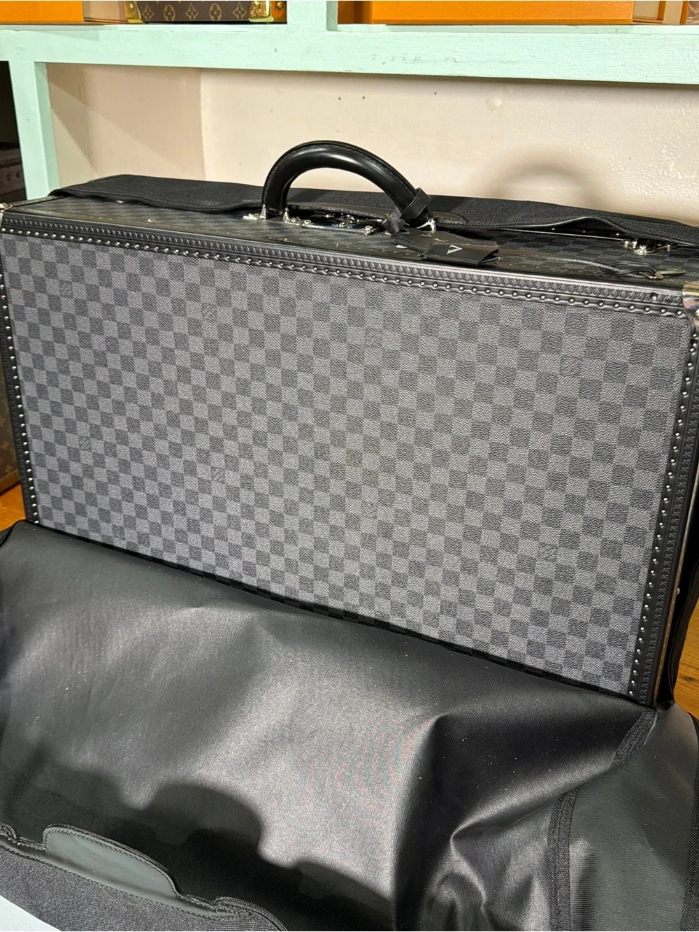 Louis Vuitton Alzer 70 Suitcase in the Damier Graphite canvas pattern